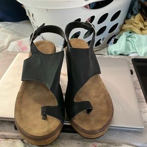 Women’s wedge sandals never worn. Size 37.